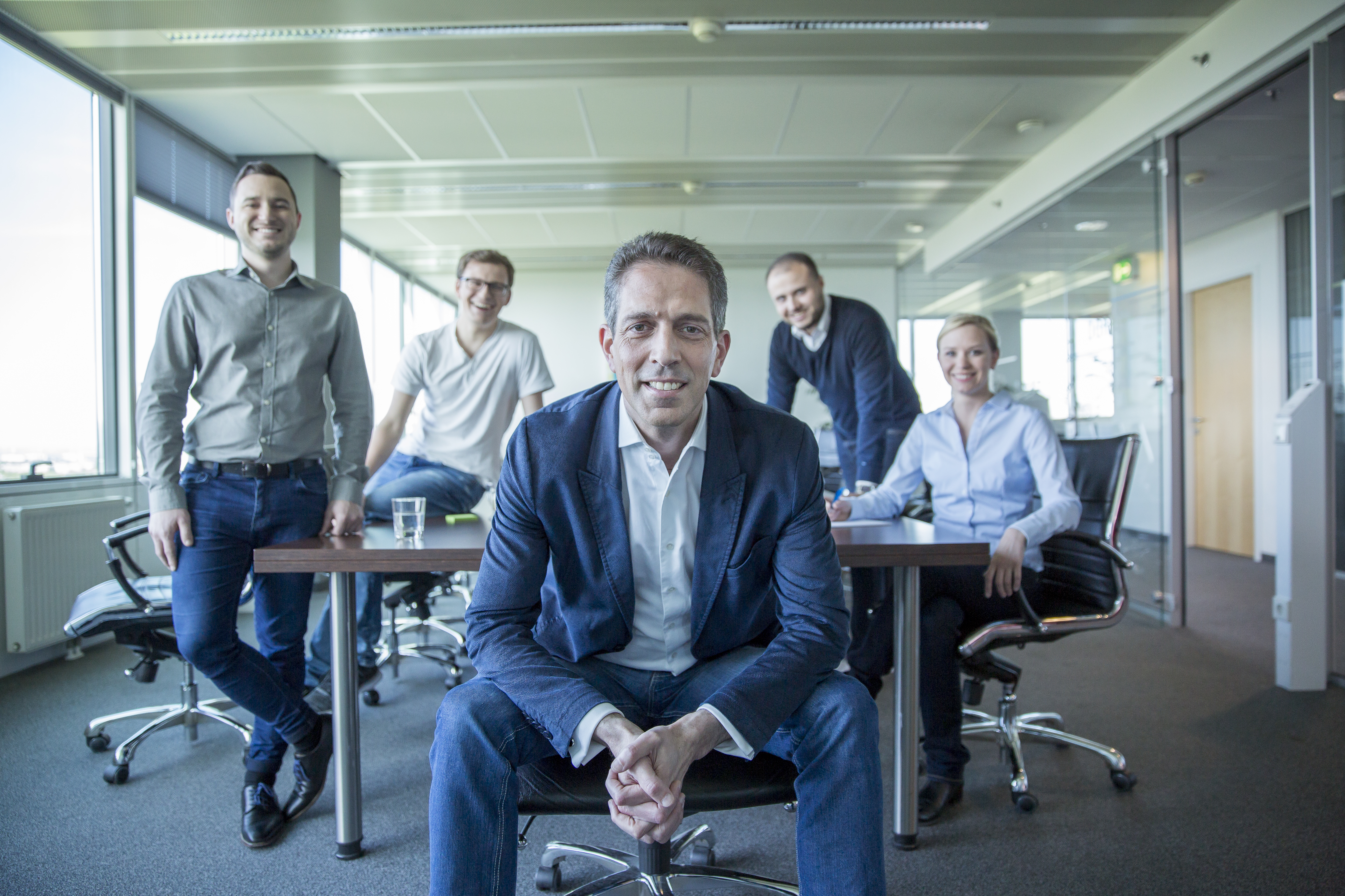 Qualysoft Österreich Geschäftsführer Stefan Resl mit seinem Team