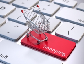 Produktqualität, Exklusivität und Markenstärke bleiben die wichtigsten Erfolgsfaktoren im eCommerce. (© Shutterstock/Sashkin) Bild von einem Einkaufswagen auf einer Computertastatur (© Shutterstock/Sashkin)